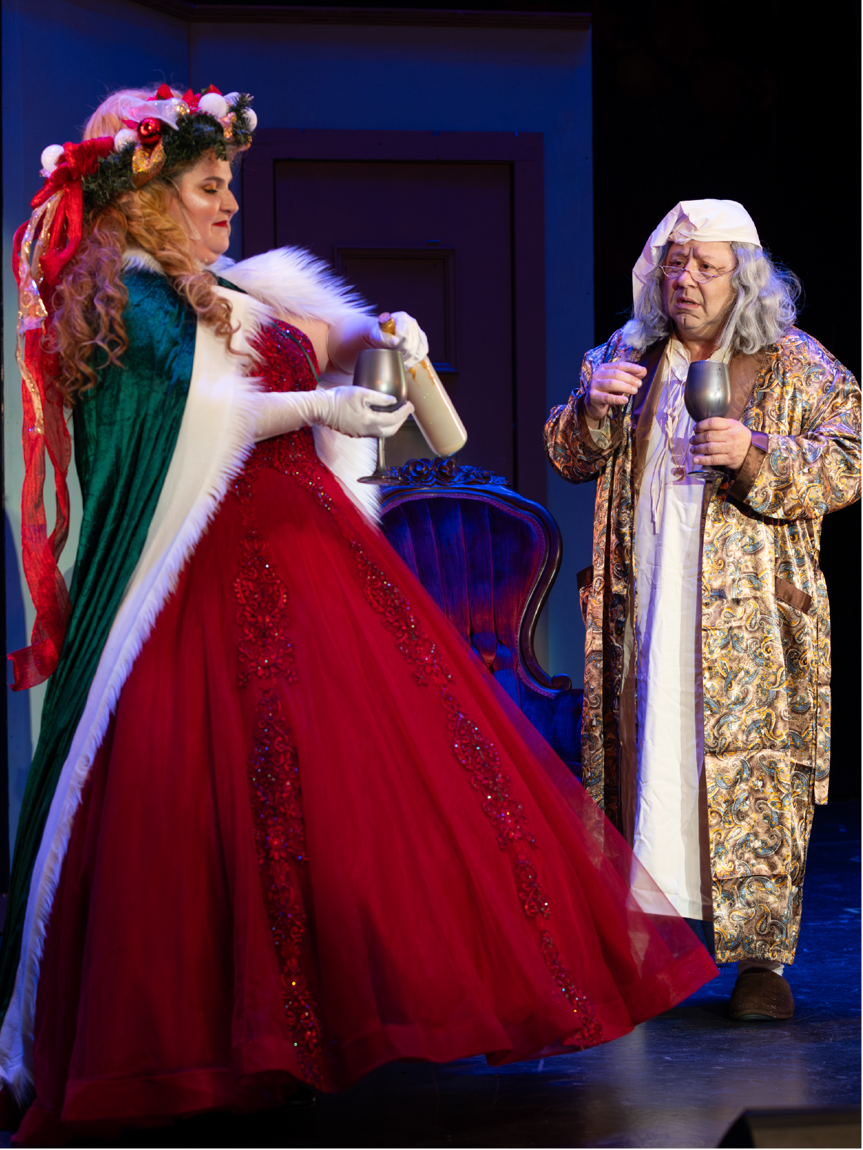 Doug DeLaughter as Scrooge and Annika Greinke as Ghost of Christmas Present